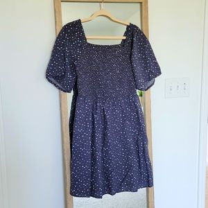 Floral smocked flutter sleeve dress